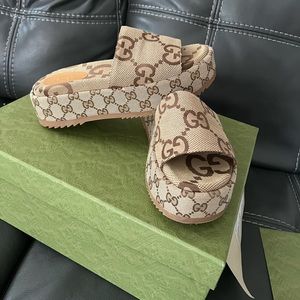 Gucci Jumbo GG WOMEN'S PLATFORM SLIDE SANDAL